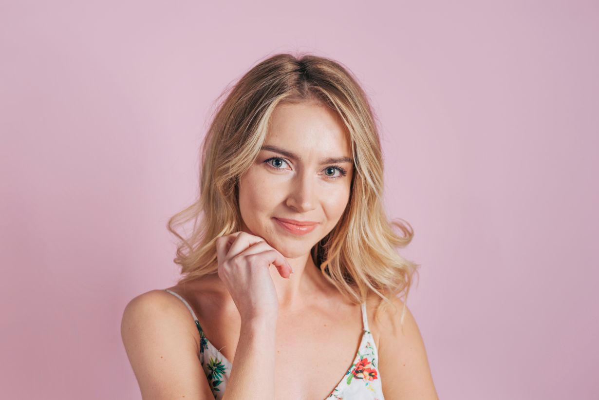 woman with hands on her face