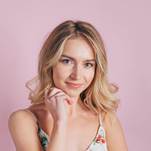 woman with hands on her face